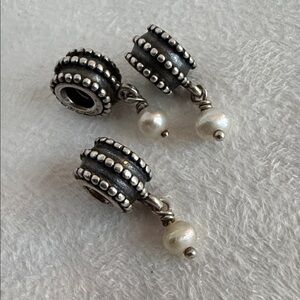 Pandora Sterling Silver Beveled Pearl Dangle Charm 
Item # 790132P